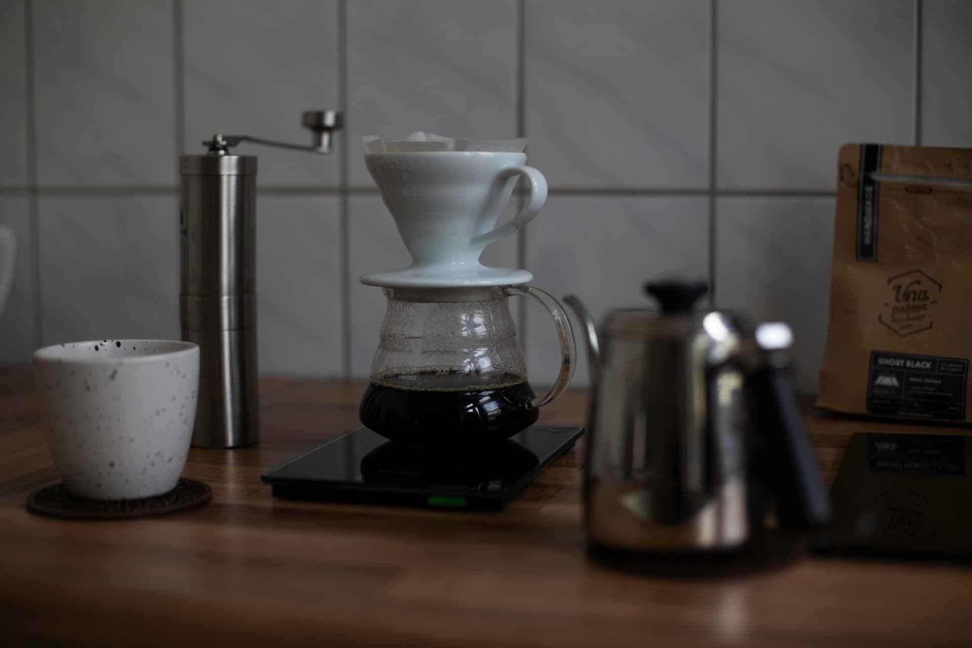 Full V60 brew setup with grinder, scale, and kettle